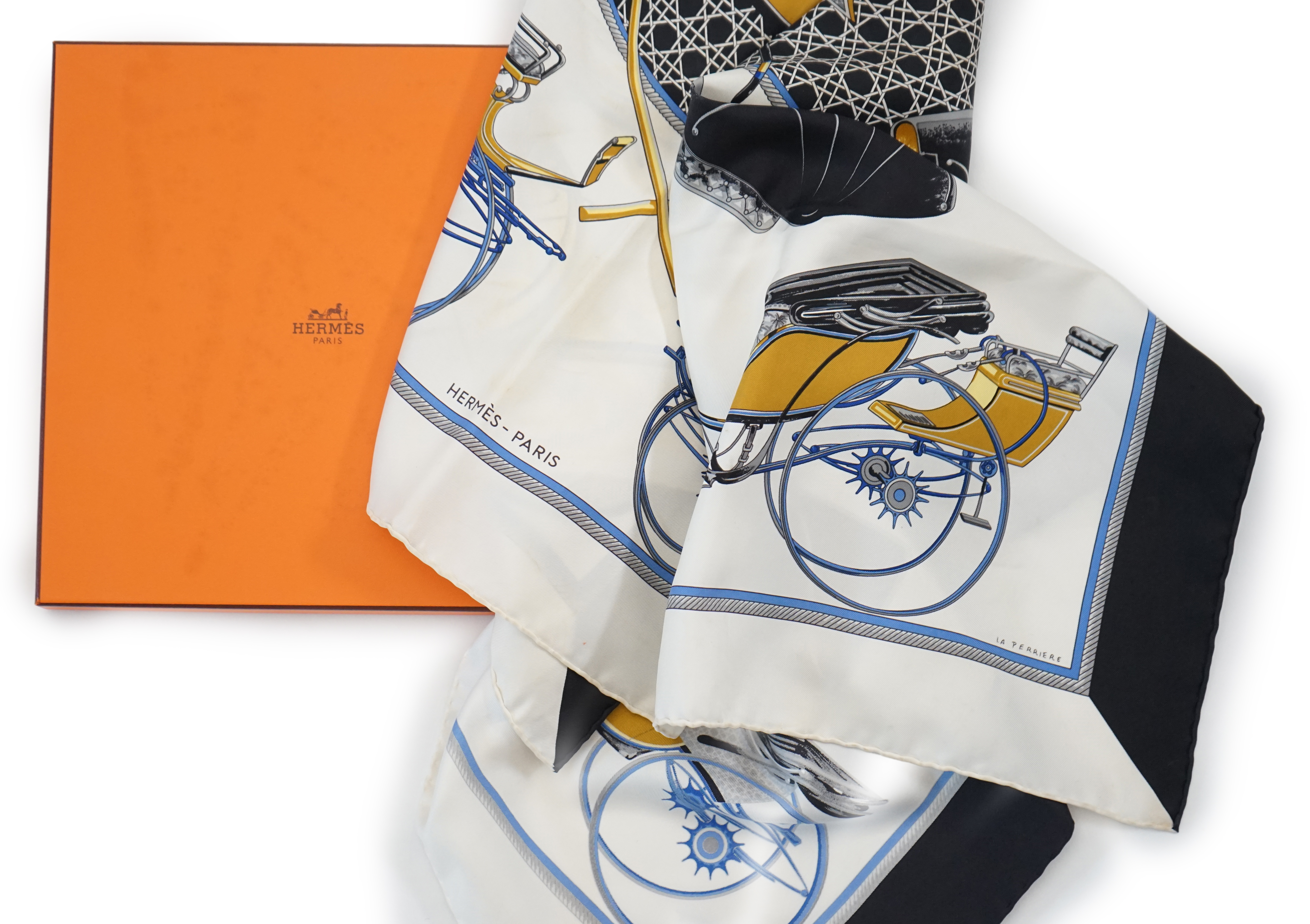 A Hermès Les Voitures a Transformation by Francoise de la Perriere black and white silk scarf, approx 90cm x 90cm